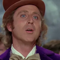 Willy Wonka gazing upward in wonder